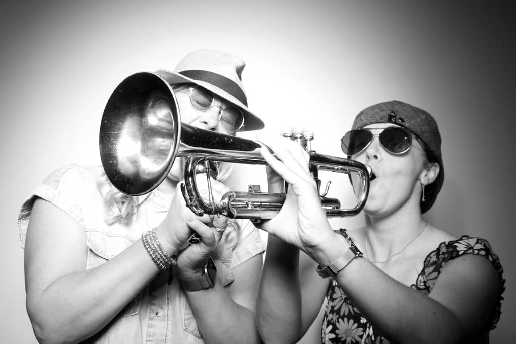 Playing trumpet in houston photo booth photo