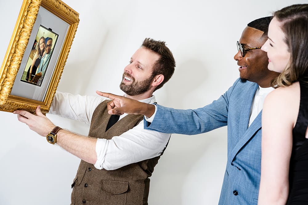 Roaming photo booth that looks like a picture frame in Houston